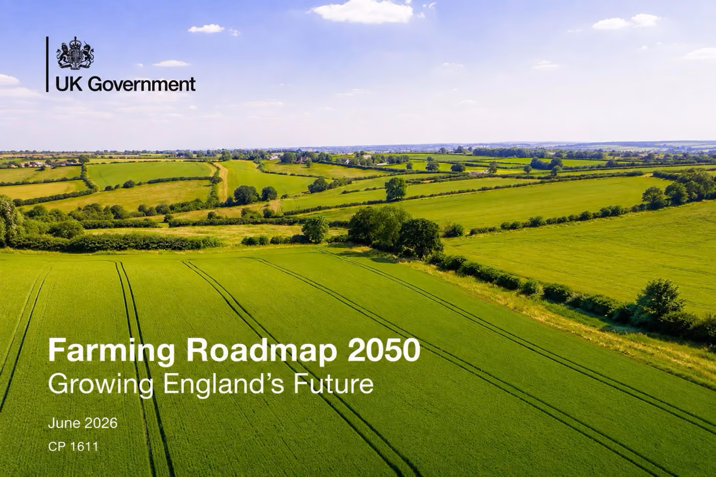 Green agricultural fields under blue sky with UK Government logo and Farming Roadmap 2050 text.